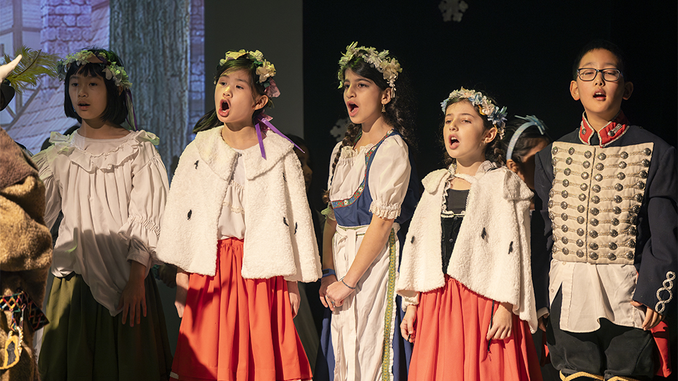 Students singing during Disney's Frozen JR. Production at Cosmo School of Music | Richmond Hill