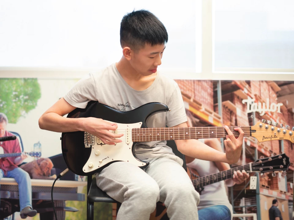 Guitar Student at the Cosmo School of Music