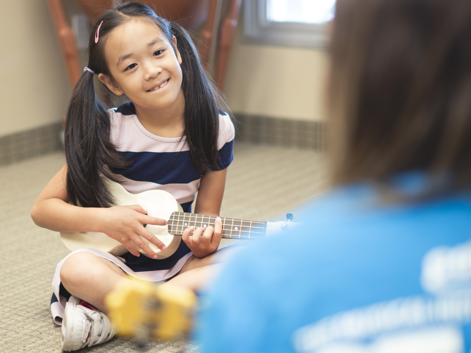 Ukulele Student at the Cosmo School of Music